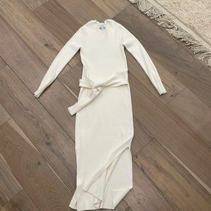 Cream colored sweater dress with slit and tie